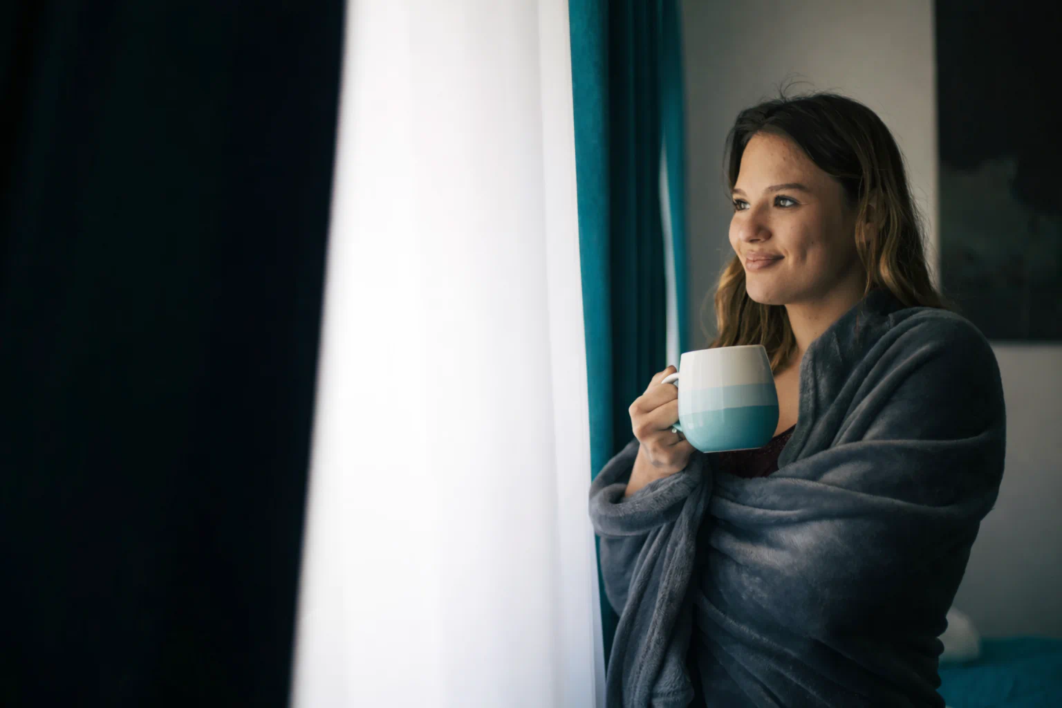 Person checking heating costs on tablet